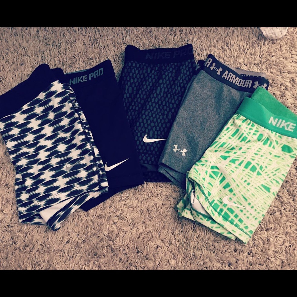bundle of under armor and nike shorts